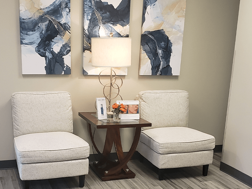 Clean, professional medical spa treatment room with neutral tones at Evolve Med Spa in Dallas
